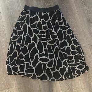 Elegant Black and White pleated Skirt